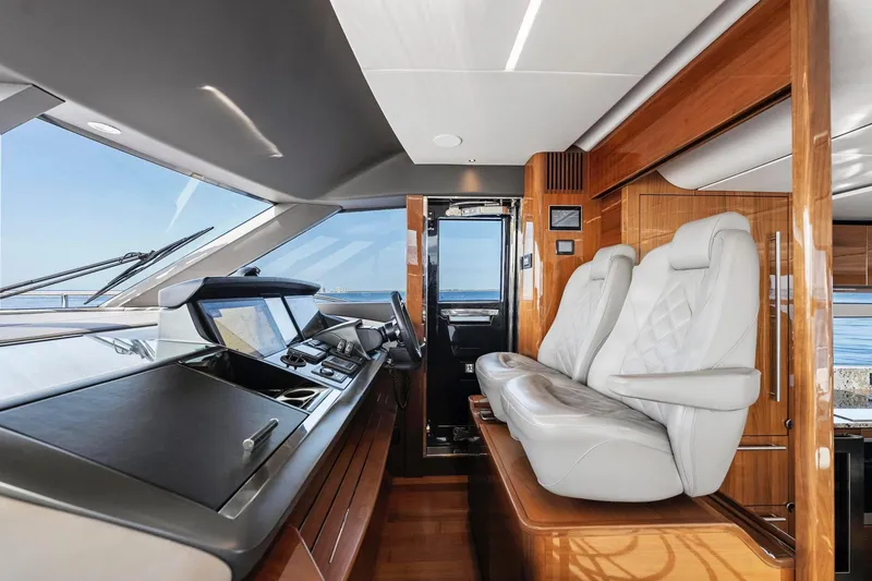 Slide: The Image of Luxurious interior of 2018 Princess Y75 yacht with modern helm and plush seating. - 18