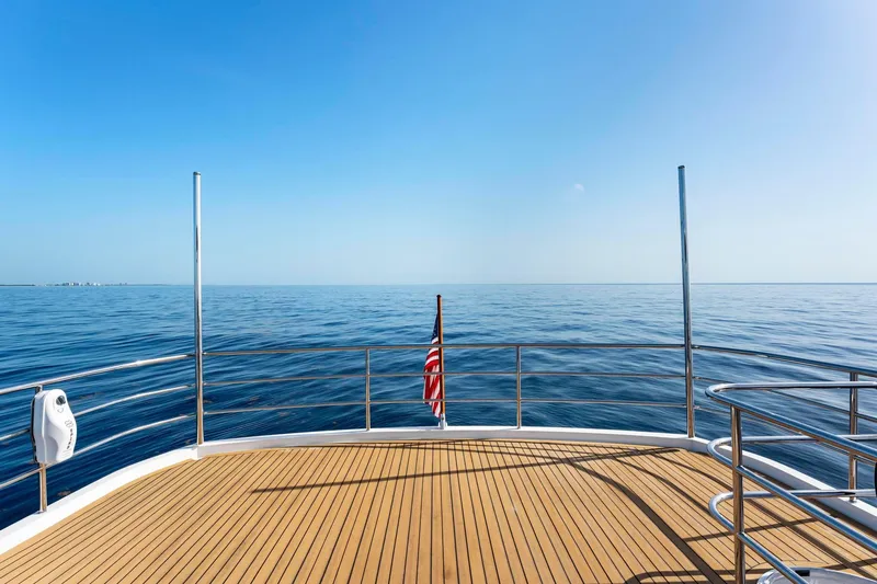 Slide: The Image of Luxurious Princess Y75 yacht deck overlooking serene ocean, 2018 model. - 56