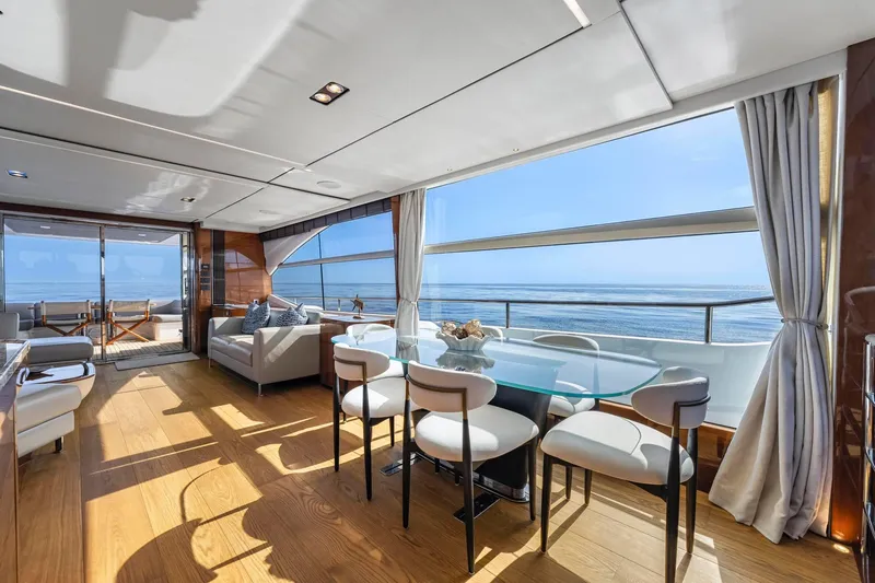 Slide: The Image of Luxurious interior of 2018 Princess Y75 yacht with ocean view and elegant dining area. - 7