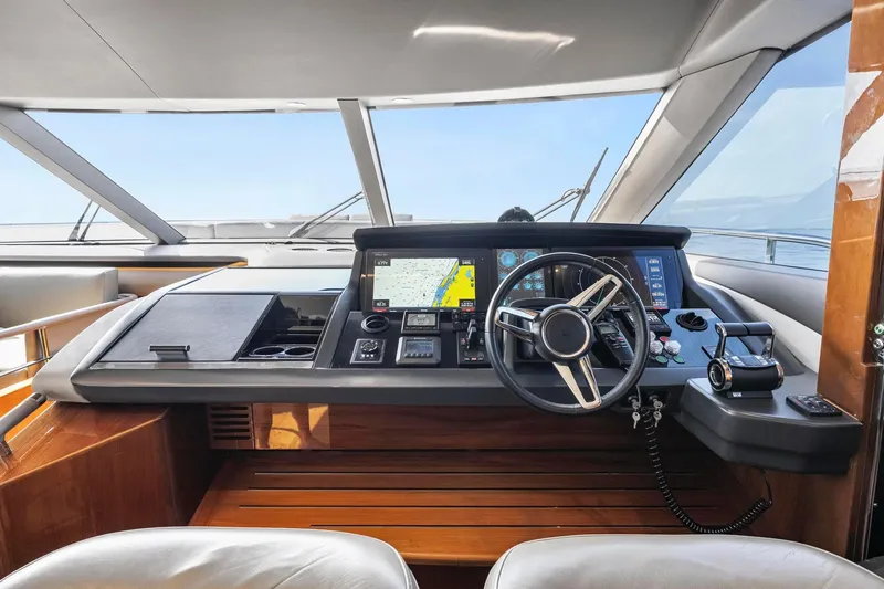 Slide: The Image of Luxurious 2018 Princess Y75 yacht helm with advanced navigation controls and panoramic view. - 20