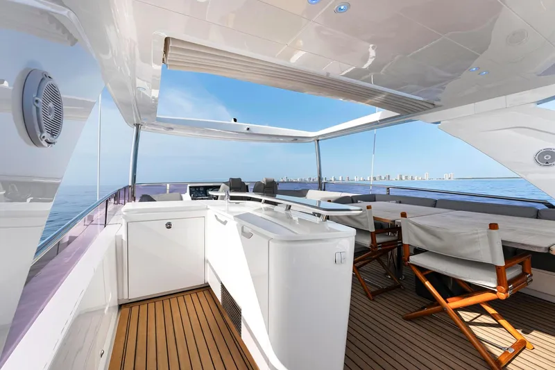 Slide: The Image of Luxurious 2018 Princess Y75 yacht deck with seating, ocean view, and modern amenities. - 59