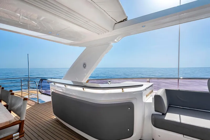 Slide: The Image of Luxurious 2018 Princess Y75 yacht deck with seating, ocean view, and modern design. - 57
