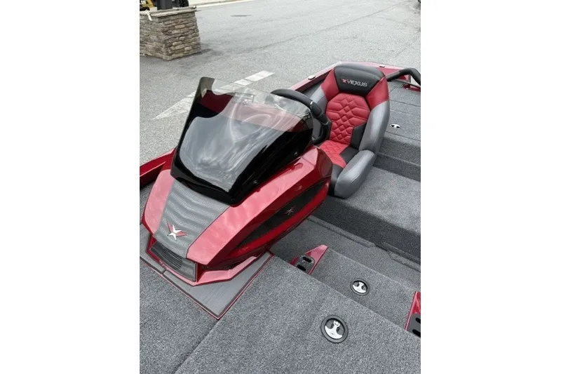 Slide: The Image of 2027 Vexus AVX1880 boat interior with red and gray seating, sleek design. - 5