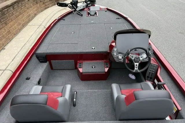 Slide: The Image of 2027 Vexus AVX1880 boat interior with dual seats, steering console, and spacious deck. - 8