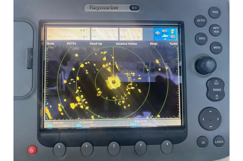 Slide: The Image of Radar display on a 1994 Robalo 2440 Walkaround boat, showing navigation data. - 7