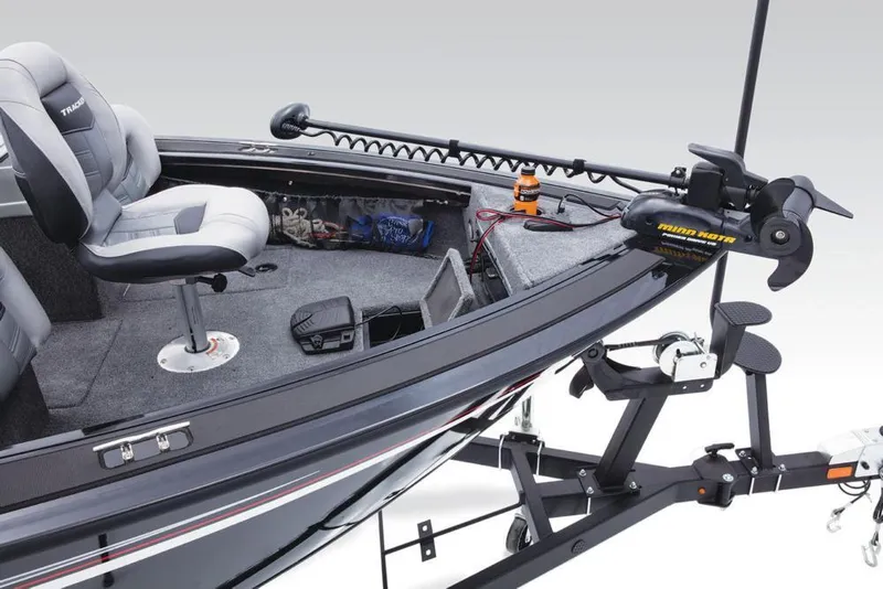 Slide: The Image of The image shows the bow deck of a 2017 Tracker Targa V-18 WT boat with a Minn Kota trolling motor. - 29
