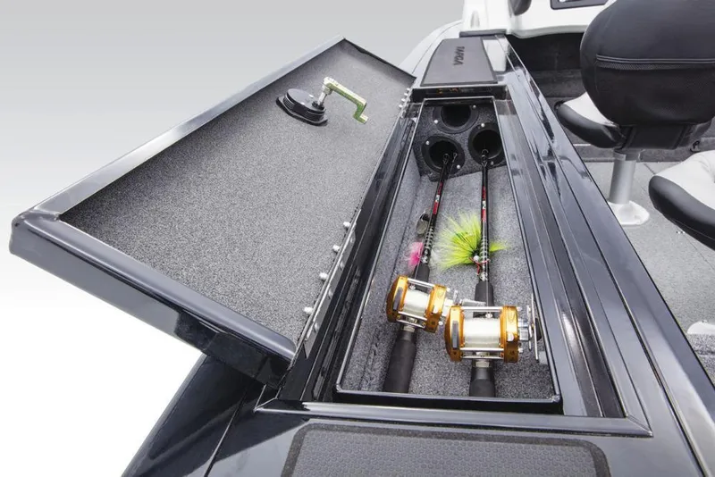 Slide: The Image of The image shows a fishing rod holder on a 2017 Tracker Targa V-18 WT boat. - 28