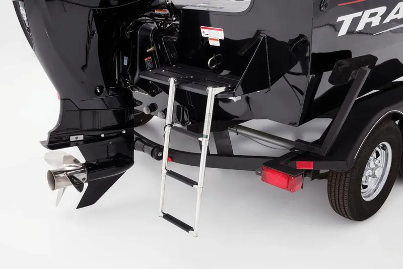 Slide: The Image of The image shows the stern of a Tracker Targa V-18 WT boat with a retractable ladder. - 25