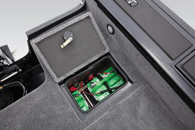Slide: The Image of A battery compartment with two green batteries is integrated into the boat's floor. - 48