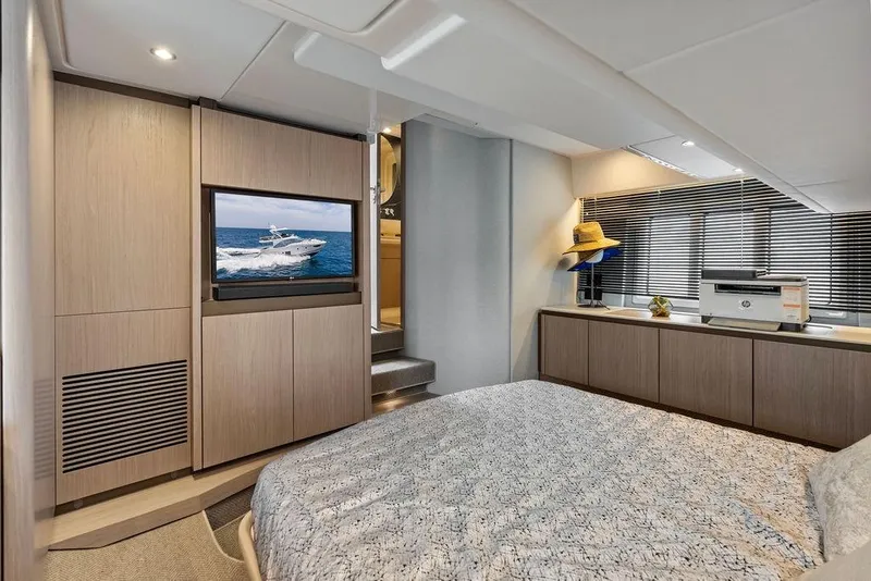 Slide: The Image of Luxurious interior of 2022 Azimut Fly 50 yacht with modern bedroom and TV. - 46
