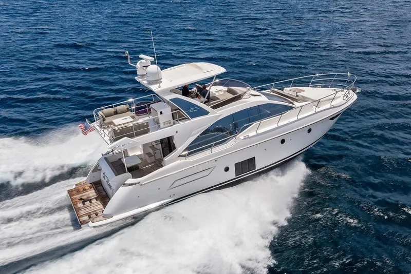 Slide: The Image of Azimut Fly 50 yacht cruising on open sea, 2022 model, elegant design. - 1