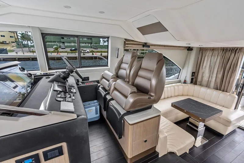 Slide: The Image of Luxurious interior of 2022 Azimut Fly 50 yacht with leather seating and modern helm. - 38