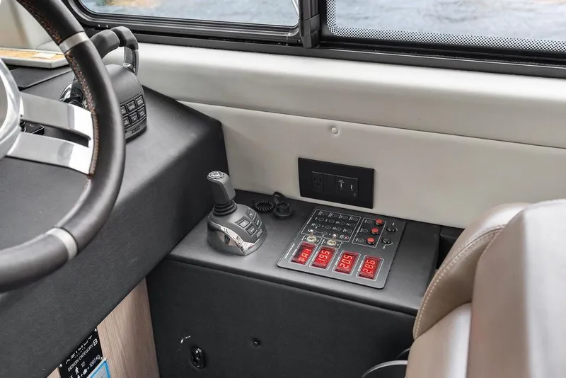 Slide: The Image of Control panel of 2022 Azimut Fly 50 yacht with joystick and digital displays. - 42