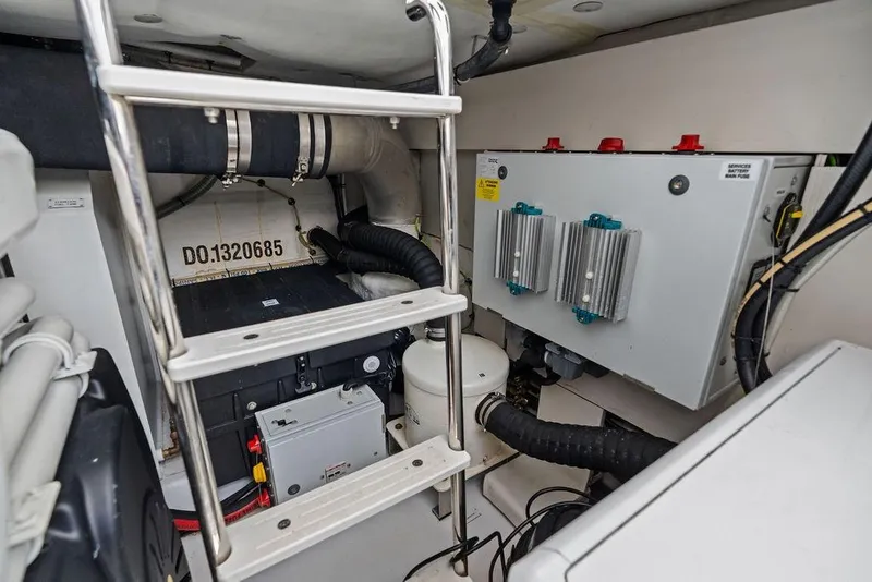 Slide: The Image of Engine room of 2022 Azimut Fly 50 yacht with equipment and ladder. - 61