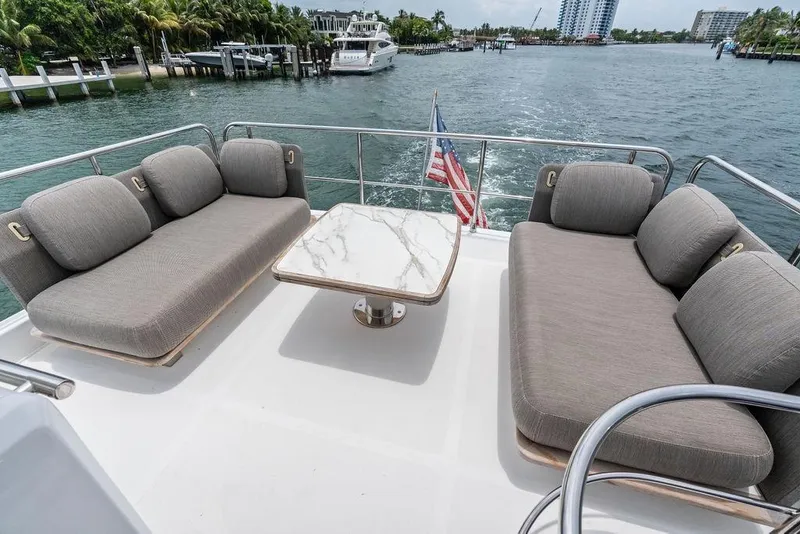 Slide: The Image of Luxurious seating area on 2022 Azimut Fly 50 yacht with scenic waterfront view. - 21