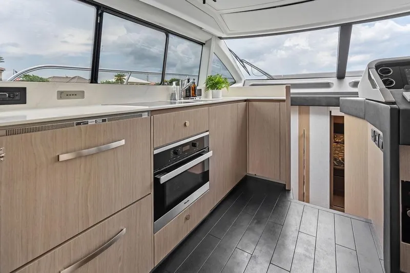 Slide: The Image of Modern kitchen interior of 2022 Azimut Fly 50 yacht with sleek cabinetry and appliances. - 34