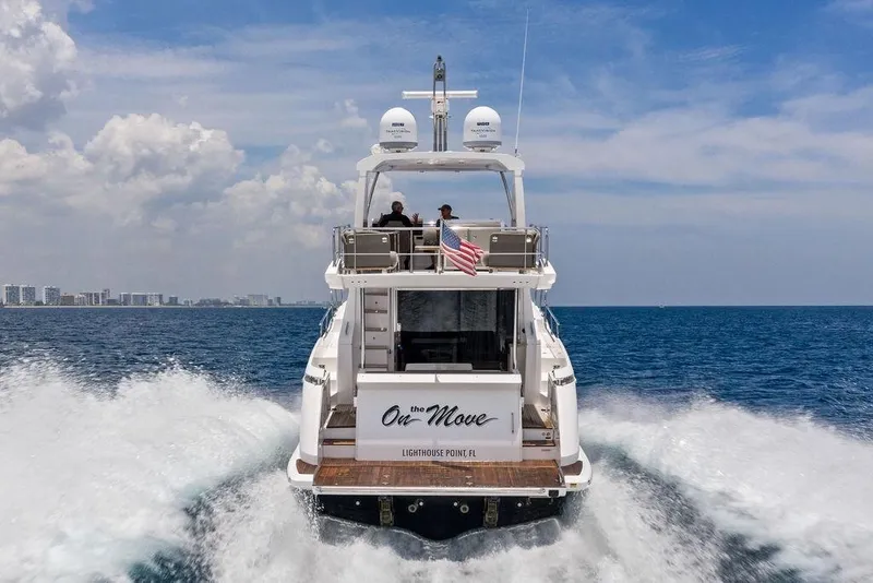 Slide: The Image of 2022 Azimut Fly 50 yacht cruising on open sea under clear skies. - 3