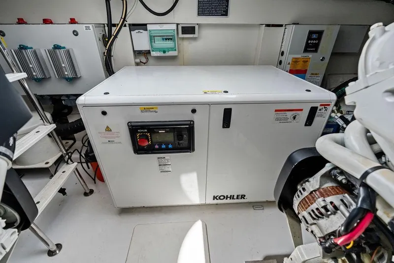 Slide: The Image of Engine room of 2022 Azimut Fly 50 yacht featuring Kohler generator. - 59