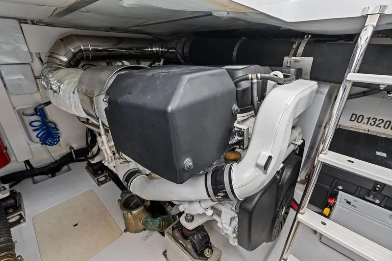 Slide: The Image of Engine room of 2022 Azimut Fly 50 yacht, showcasing modern marine engine components. - 58