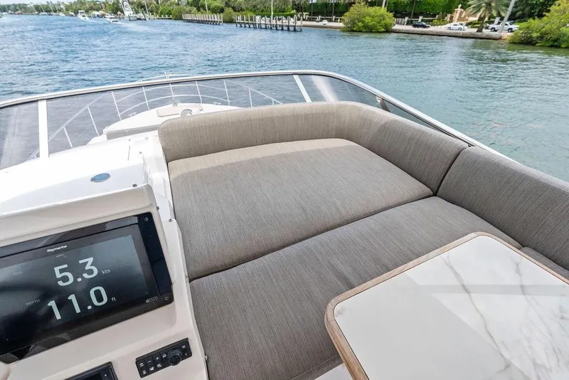 Slide: The Image of 2022 Azimut Fly 50 yacht deck with seating and navigation display. - 27