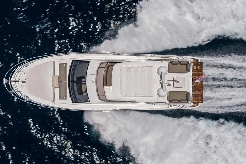 Slide: The Image of Aerial view of 2022 Azimut Fly 50 yacht cruising on open water. - 4
