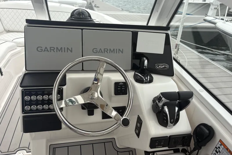 Slide: The Image of 2023 Sea Fox 268 Traveler helm with Garmin displays and modern controls. - 17