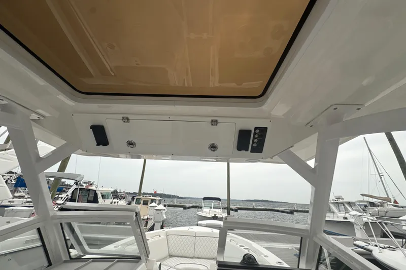 Slide: The Image of Interior view of 2023 Sea Fox 268 Traveler boat at a marina. - 37