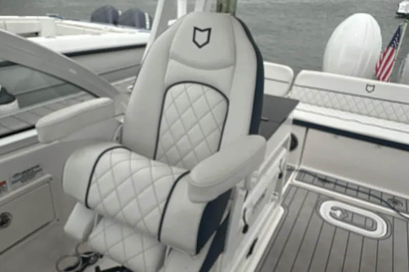 Slide: The Image of Luxurious seating on 2023 Sea Fox 268 Traveler boat with quilted upholstery. - 28