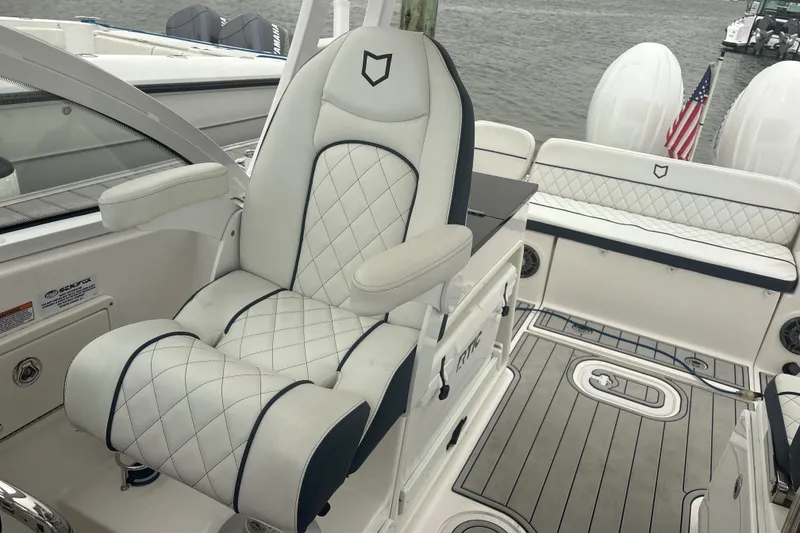 Slide: The Image of Luxurious seating on 2023 Sea Fox 268 Traveler boat, featuring elegant white upholstery and modern design. - 27