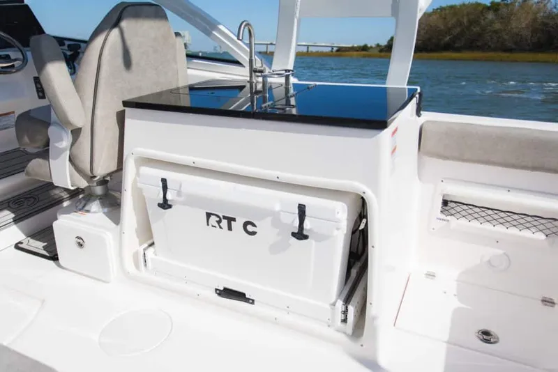 Slide: The Image of Manufacturer Provided Image: 2023 Sea Fox 268 Traveler boat interior with cooler and sink. - 69