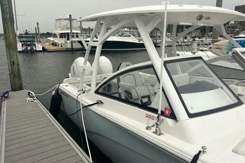 Slide: The Image of 2023 Sea Fox 268 Traveler boat docked at marina, featuring sleek design and modern amenities. - 14