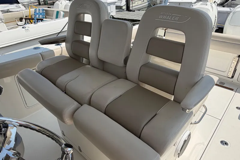 Slide: The Image of 2017 Boston Whaler 330 Outrage boat seating, featuring comfortable, cushioned design and sleek finish. - 27