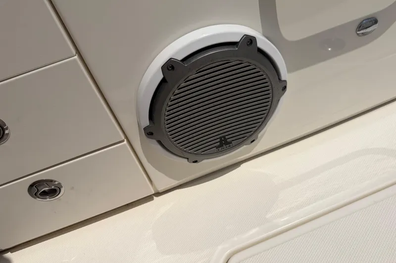 Slide: The Image of Speaker on a 2017 Boston Whaler 330 Outrage boat, showcasing marine audio equipment. - 32