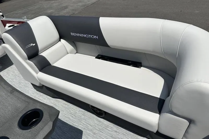 Slide: The Image of 2026 Bennington S Quad Bench 20 SSR boat seat, white and black upholstery. - 6