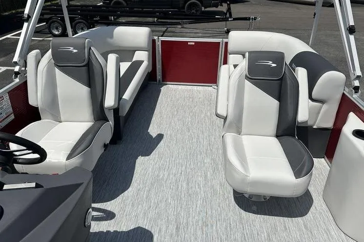 Slide: The Image of 2026 Bennington S Quad Bench 20 SSR pontoon boat interior with gray and white seating. - 14