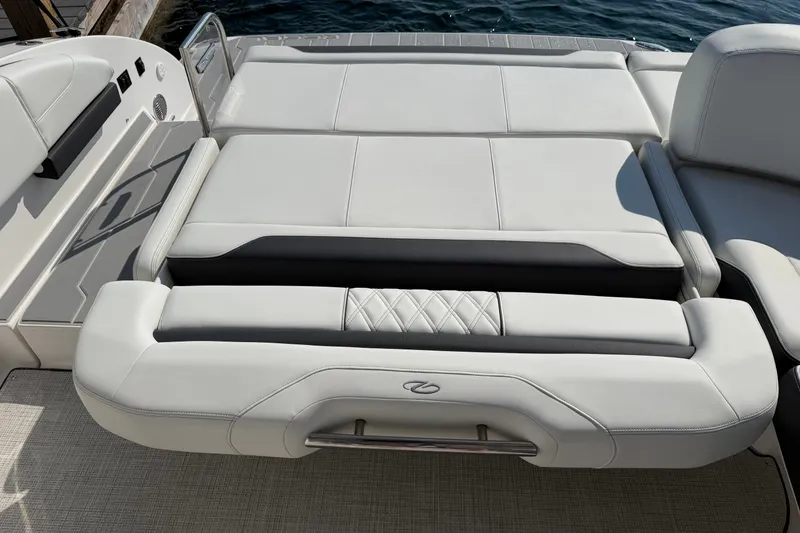 Slide: The Image of Luxurious seating on 2027 Regal 3300 boat, featuring elegant white upholstery. - 24