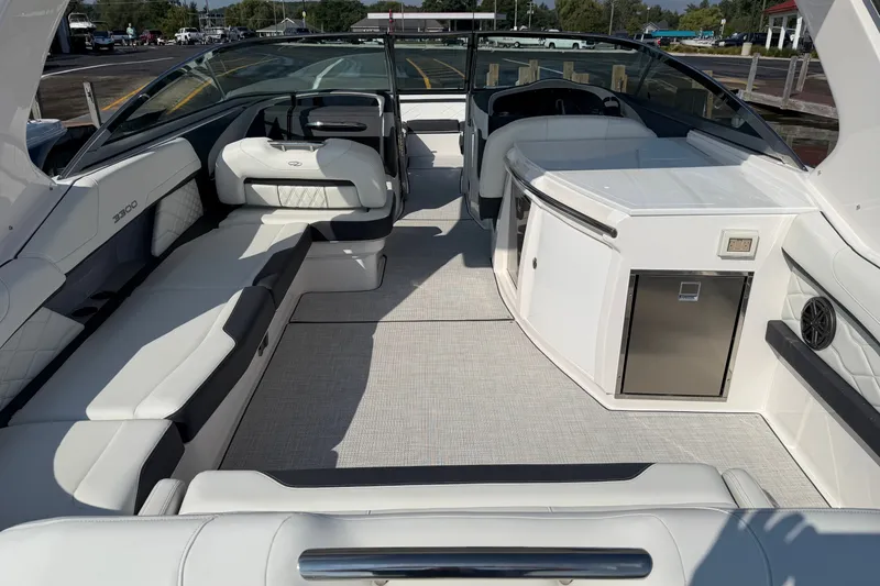 Slide: The Image of 2027 Regal 3300 boat interior with luxurious seating and modern amenities. - 17