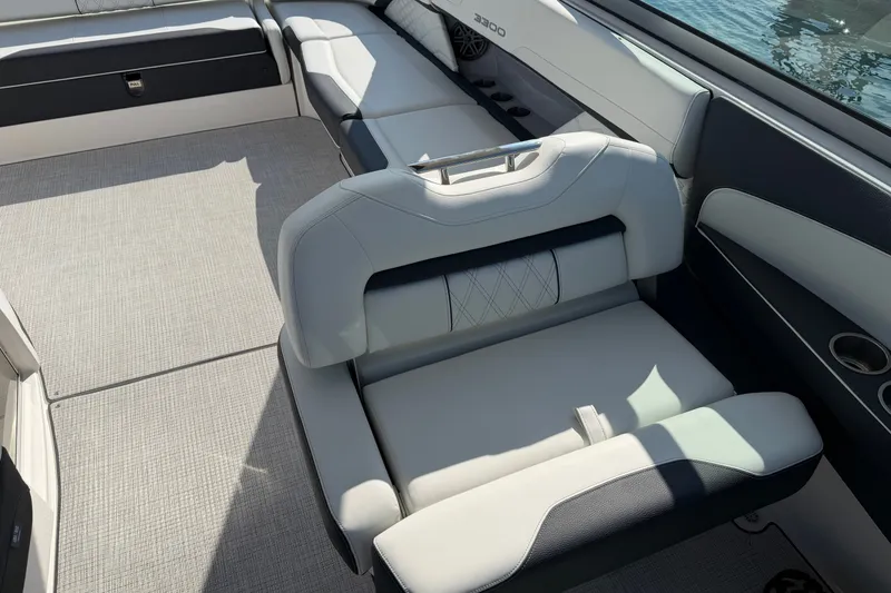 Slide: The Image of Luxurious seating on a 2027 Regal 3300 boat, featuring elegant upholstery and spacious design. - 20