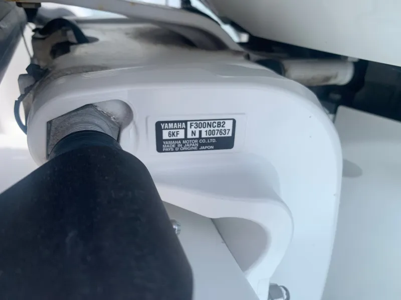 Slide: The Image of Close-up of a Yamaha outboard motor on an Everglades 243 Center Console boat. - 33
