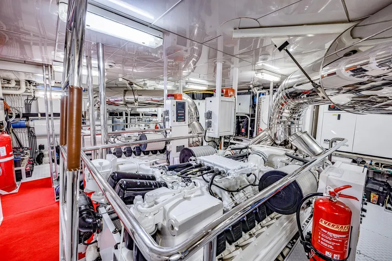 Slide: The Image of Engine room of 2004 Holland Jachtbouw Custom yacht, featuring advanced machinery and safety equipment. - 67