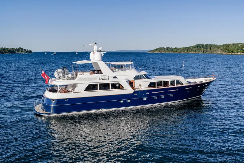 Slide: The Image of Luxurious 2004 Holland Jachtbouw Custom yacht cruising on serene blue waters. - 89
