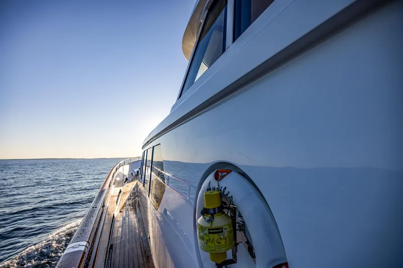 Slide: The Image of Side view of 2004 Holland Jachtbouw Custom yacht cruising on open water. - 20