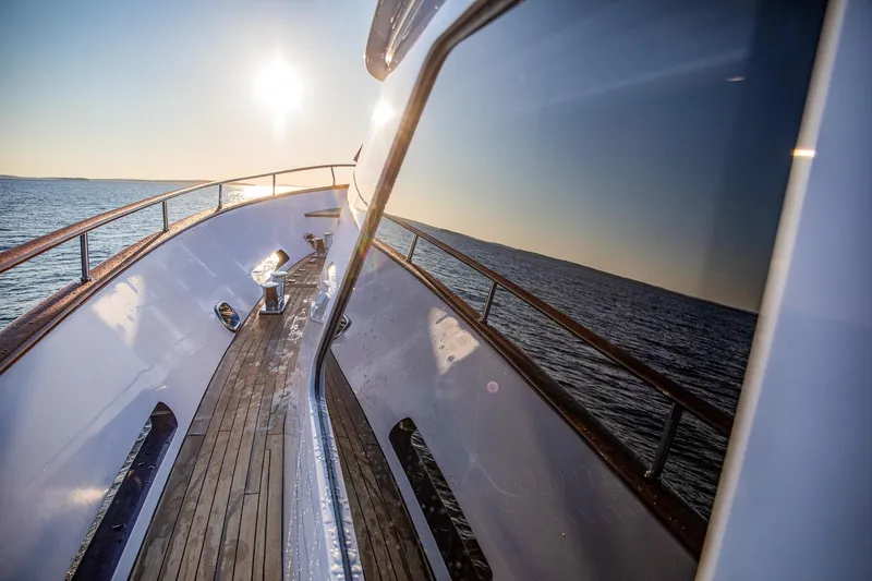 Slide: The Image of Luxurious 2004 Holland Jachtbouw Custom yacht deck with ocean view at sunset. - 19