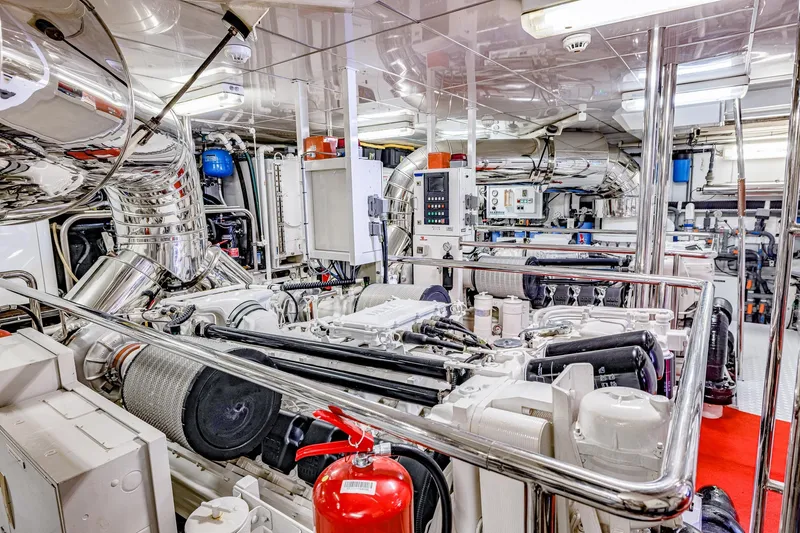 Slide: The Image of Engine room of 2004 Holland Jachtbouw Custom yacht, featuring advanced machinery and polished metal surfaces. - 64