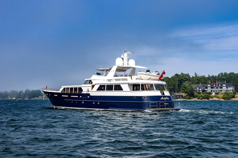Slide: The Image of Luxurious 2004 Holland Jachtbouw Custom yacht cruising on a scenic waterway. - 71
