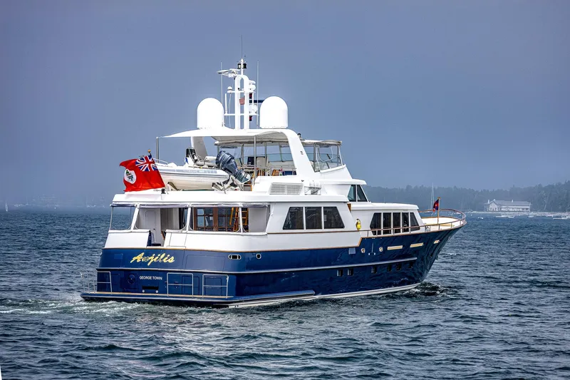 Slide: The Image of Luxurious 2004 Holland Jachtbouw Custom yacht cruising on a serene waterway. - 77