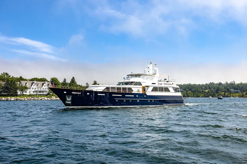 Slide: The Image of Luxurious 2004 Holland Jachtbouw Custom yacht cruising on a scenic waterway. - 72