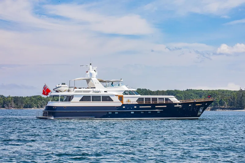 Slide: The Image of Luxury yacht on water, Holland Jachtbouw Custom 2004 model, clear sky background. - 88