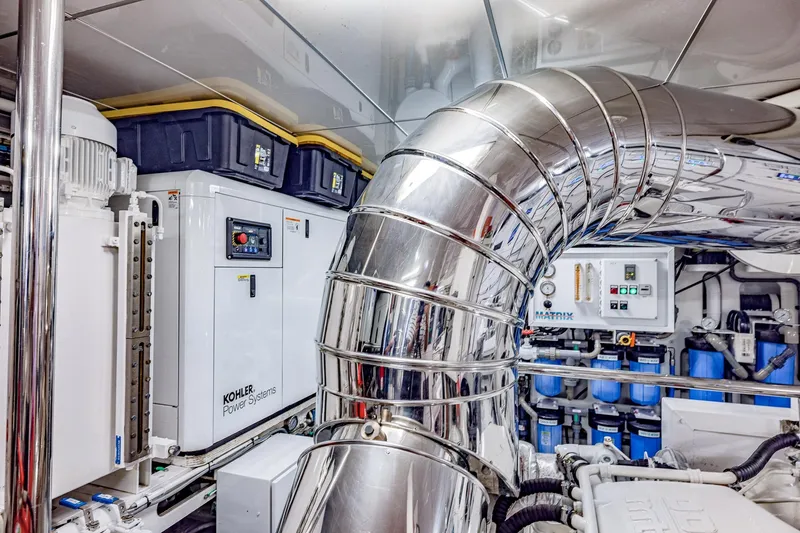 Slide: The Image of Engine room of 2004 Holland Jachtbouw Custom yacht with Kohler power systems and stainless steel ductwork. - 65