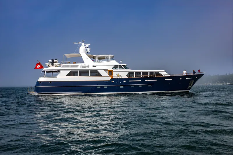 Slide: The Image of Luxury 2004 Holland Jachtbouw Custom yacht on open water, featuring sleek design and elegant structure. - 70